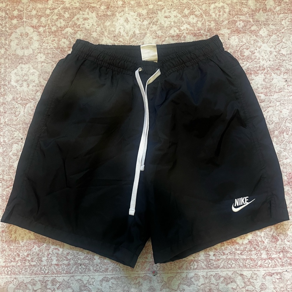 Nike boys Black Swim/Training Shorts with White Logo